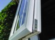 A top opening casement with wrap around gearing