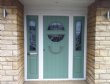 Chartwell Green composite door with Composite side panels