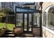 Dark frame lean to conservatory