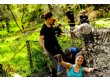 Carla, Kate and Matt struggle through the mud